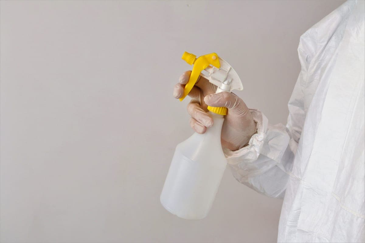 A panel being misted with lubricant before a clay bar is used on it