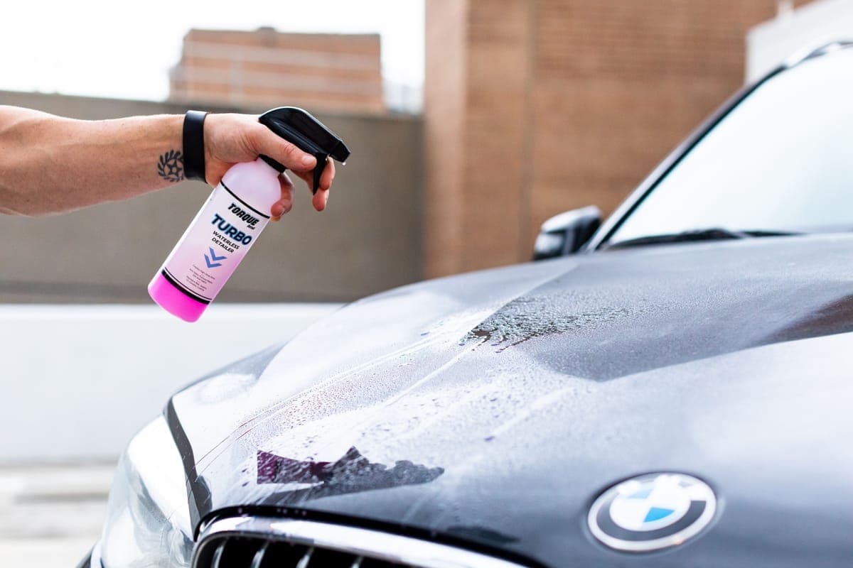 Decontamination product reacting and running down a light-colored car panel